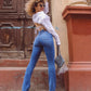 High Waist Flare Jeans In Medium Dark Washed Blue